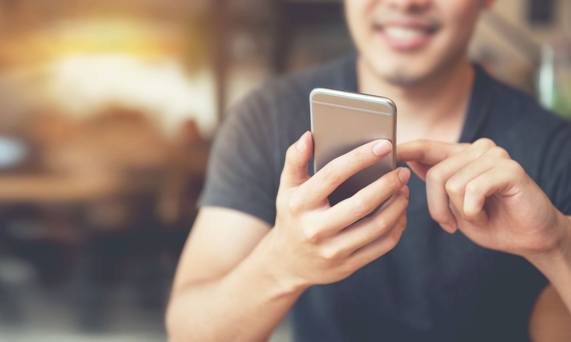 man on phone smiling