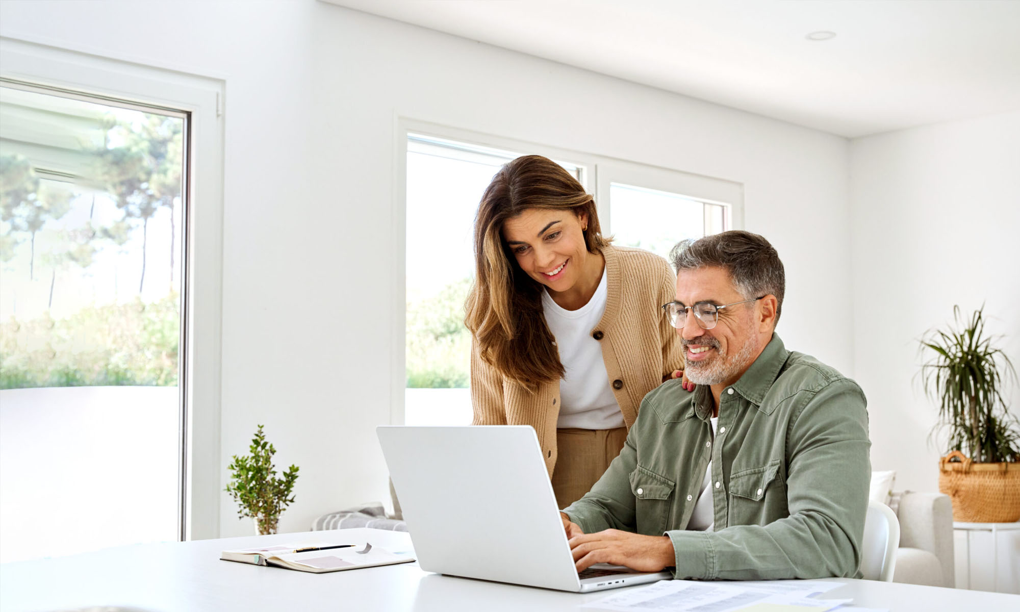 couple filling out application online
